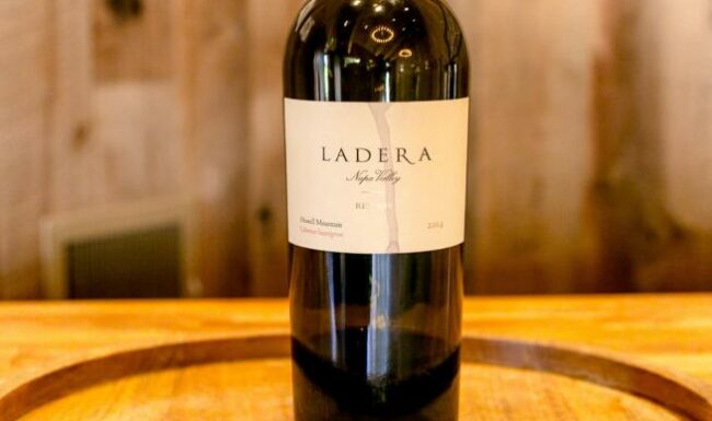 Bottle of Ladera Cabernet Sauvignon atop a wooden platter